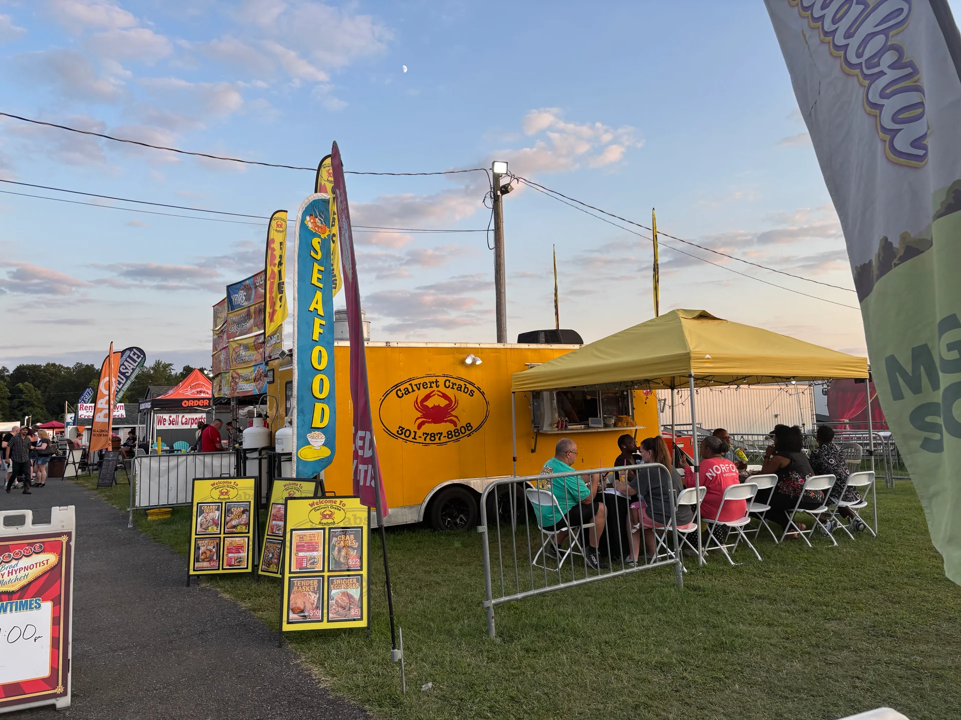 The Calvert Crabs food truck at a festival at sunset